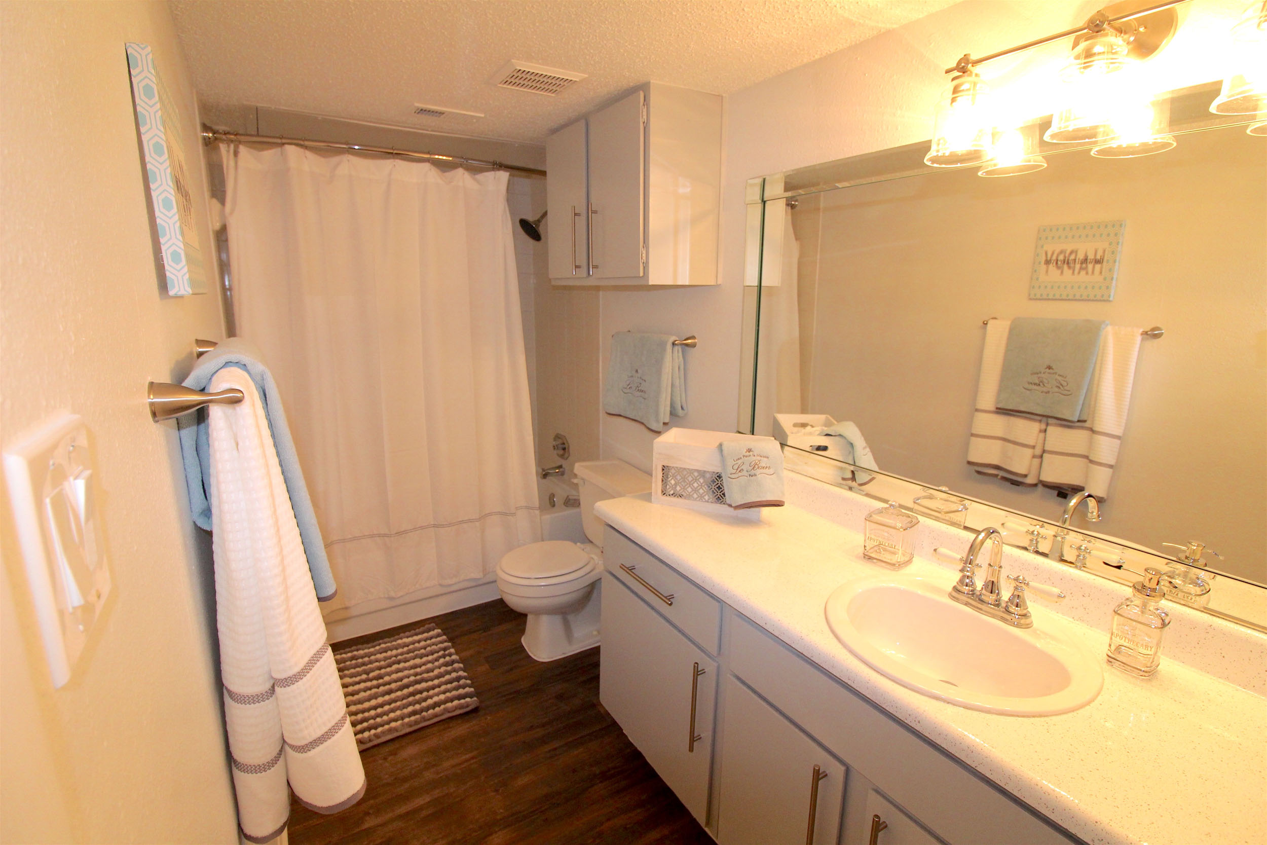 Bathroom with sink shower and toilet