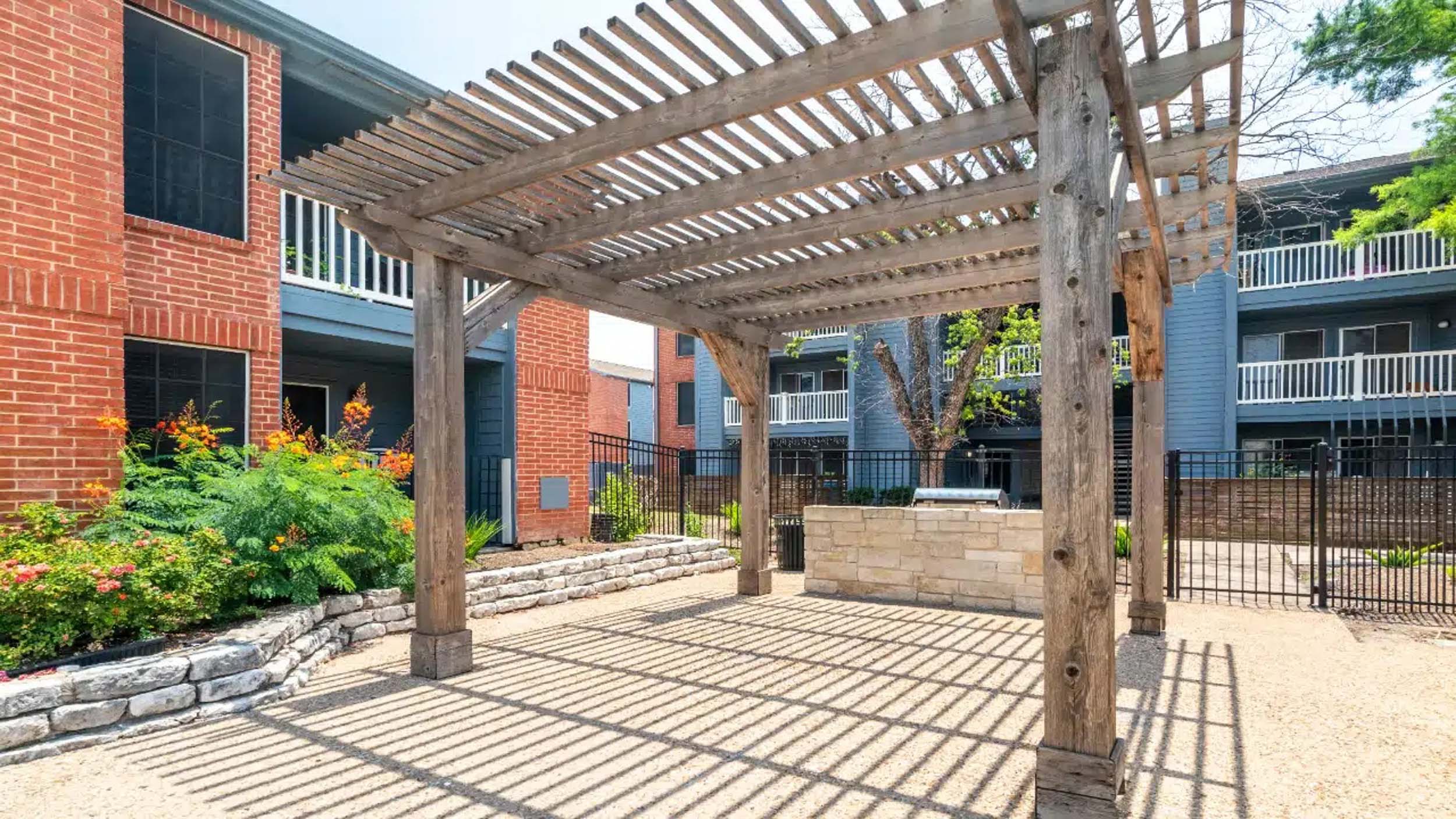 Outdoor pergola in grilling area