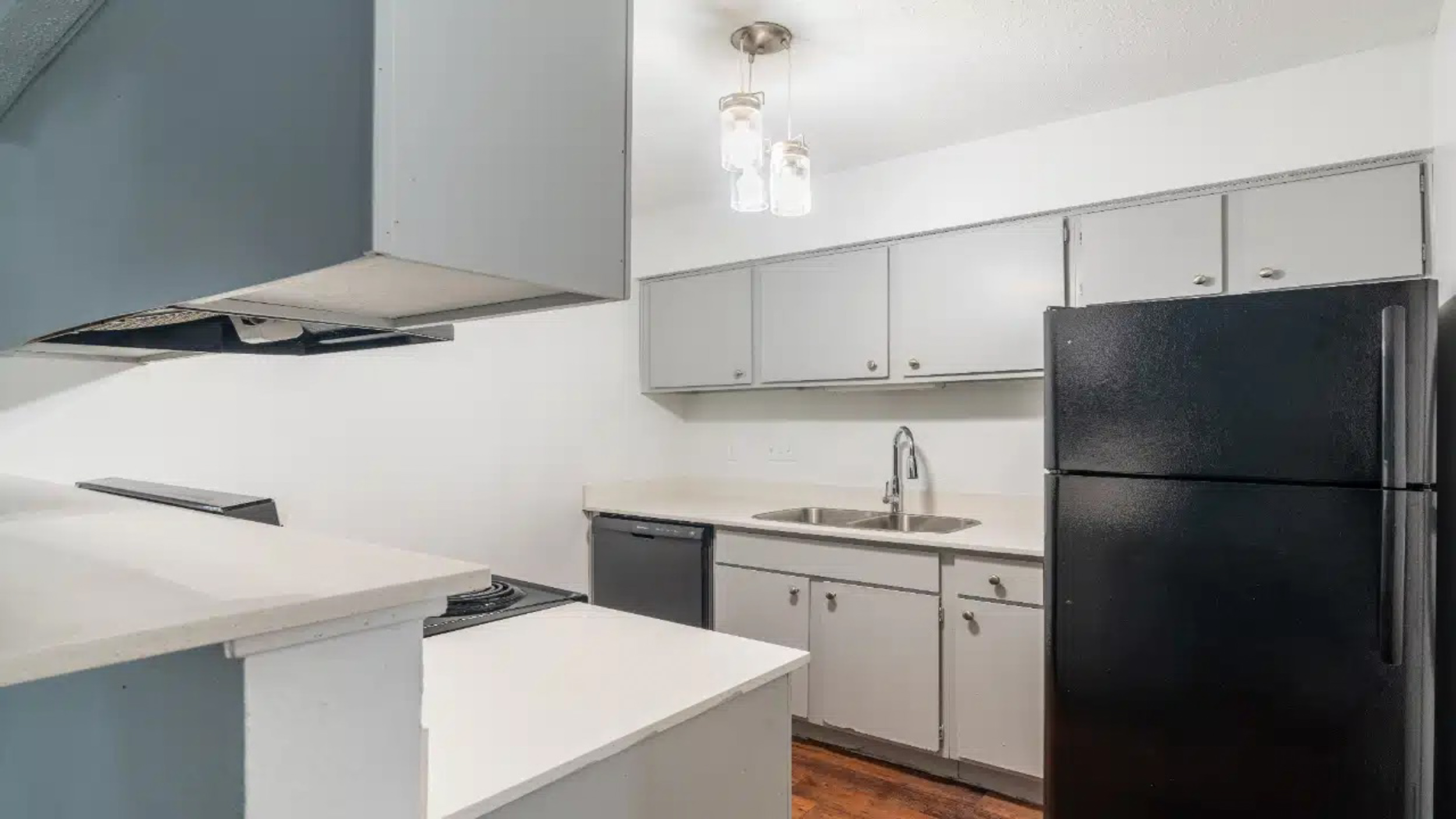 Simple kitchen with gray cabinets