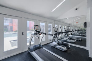 a room with treadmills and treadmills