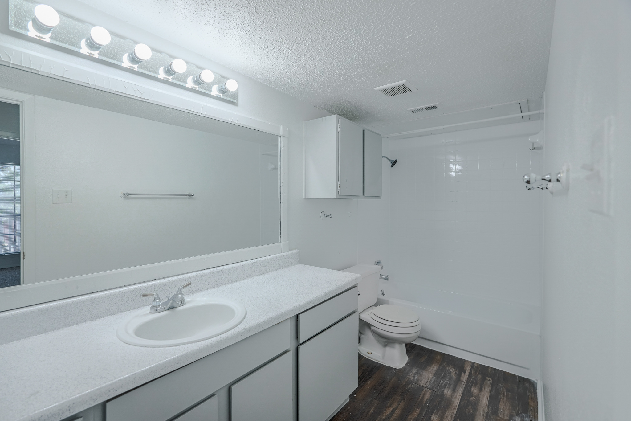 a bathroom with a sink and toilet
