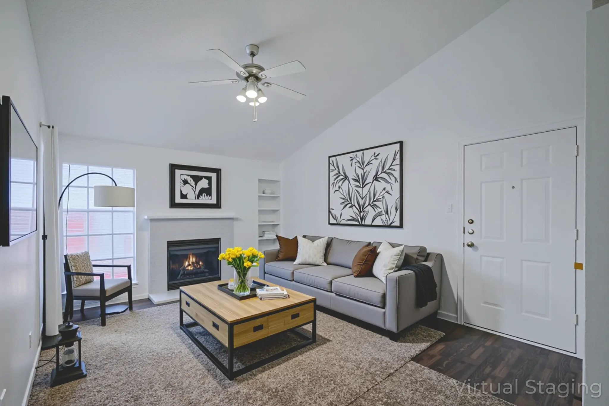 a living room with a fireplace and a couch